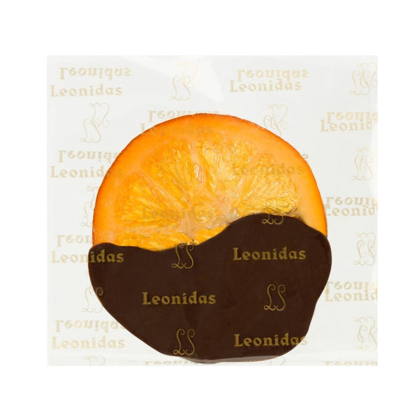 OrangeTrempée - esența combinației acrișor-dulce este o felie de portocală de Valencia în suc propriu, învelită pe jumătate în ciocolată neagră Leonidas