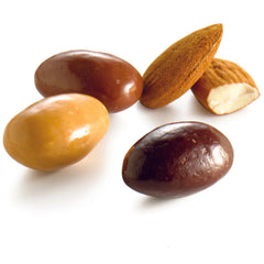 Stones - migdale caramelizate, crocante, din Ecuador, acoperite cu ciocolată blondă, neagră sau cu lapte Leonidas
