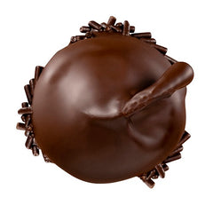 Pralină realizată manual cu o cireașă Morello întreagă, cu codiță, scufundată în cremă de lichior, imbrăcată în ciocolată neagră crunchy, pentru o plăcere intensă