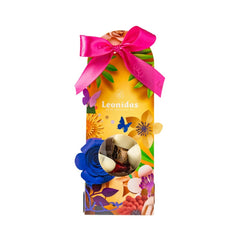 Cutie cadou cu praline Leonidas cu design floral si culori vibrante