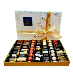 Premium Christmas este o cutie Ediție de Crăciun cu un mix de 42 praline belgiene Leonidas din cea mai fină ciocolată belgiană